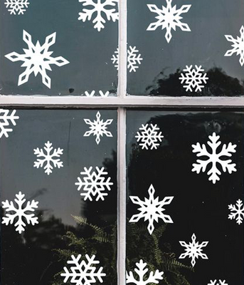 Новорічний декор - наклейки-сніжинки на скло (27 наклейок) H119 фото
