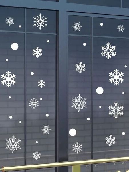 Новогодний декор - наклейки-снежинки на стекло (27 наклеек) H119 фото