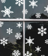 Новогодний декор - наклейки-снежинки на стекло (27 наклеек)